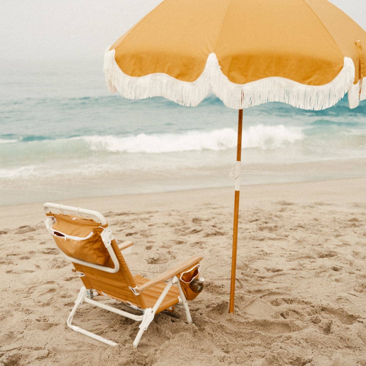 Vintage gold holiday tommy on the beach