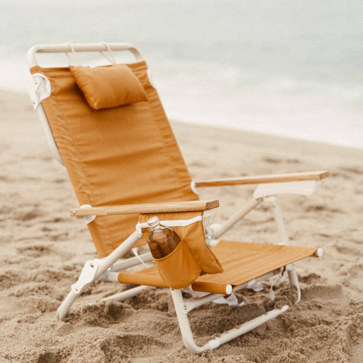 Vintage gold holiday tommy on the beach