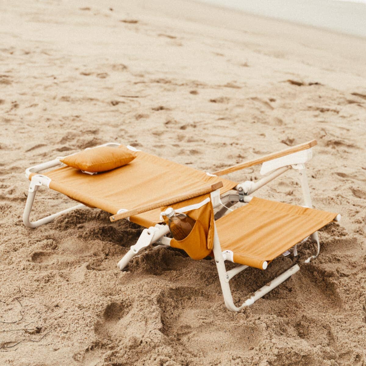 Vintage gold holiday tommy on the beach