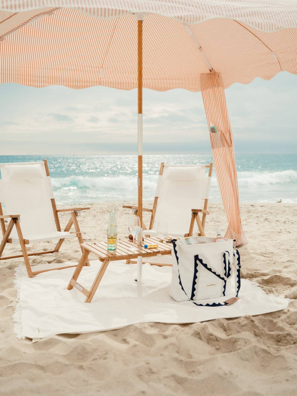 Beach set up with cabana, chairs and accessories