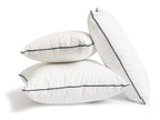 studio image of small white throw pillow