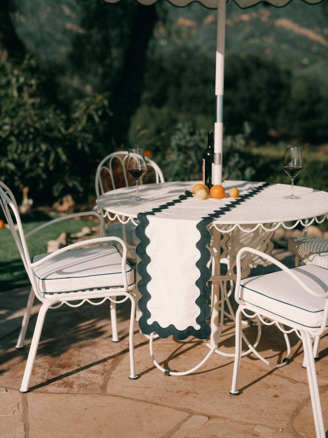 al fresco dining table, chairs on a patio
