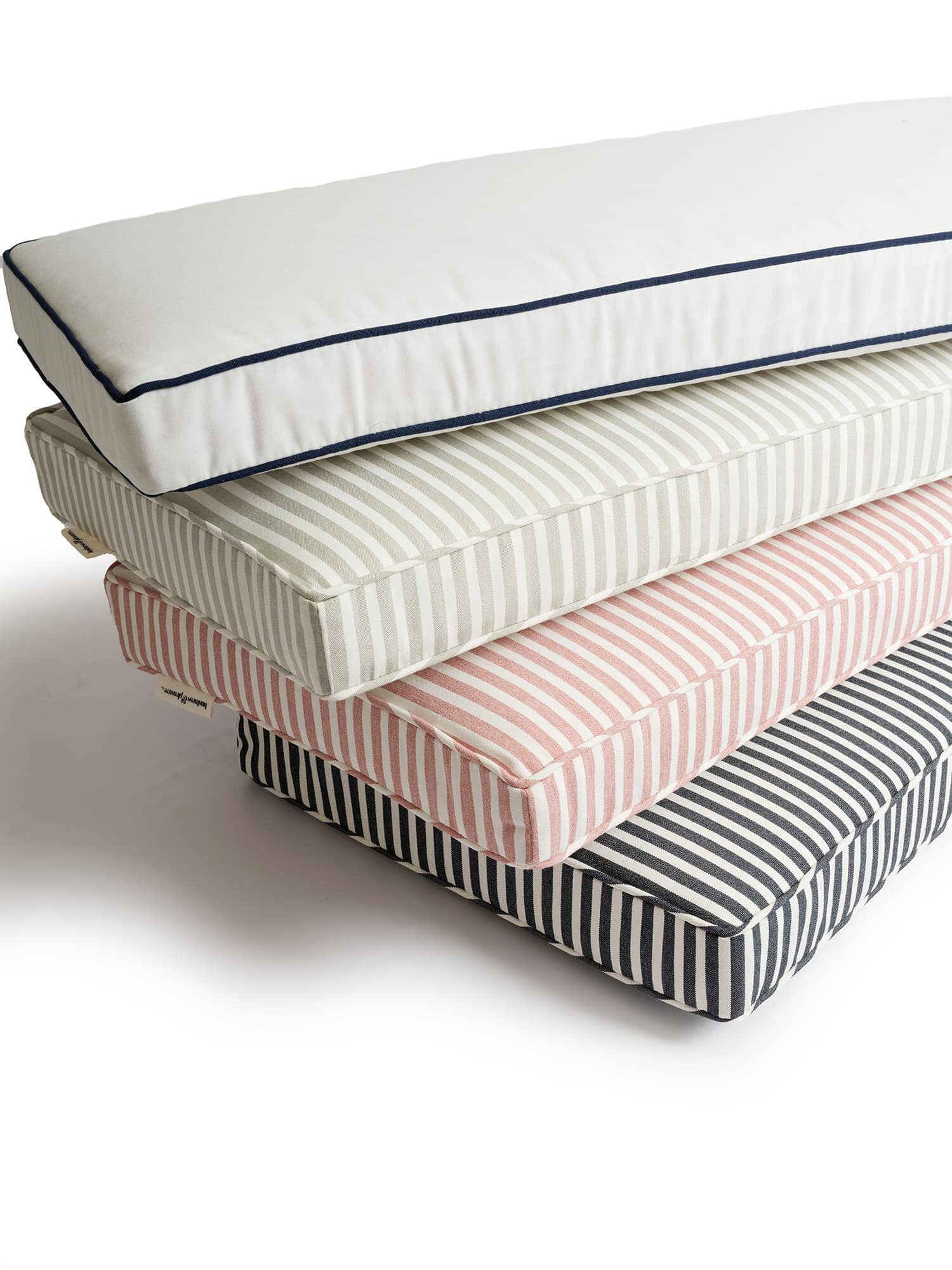 stack of 4 colored bench pillows