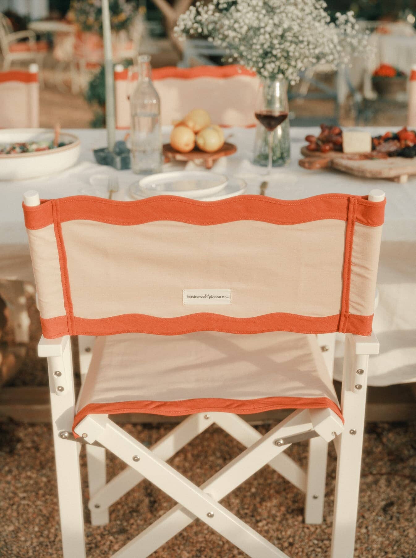 alfresco dining setting with riviera pink directors chair