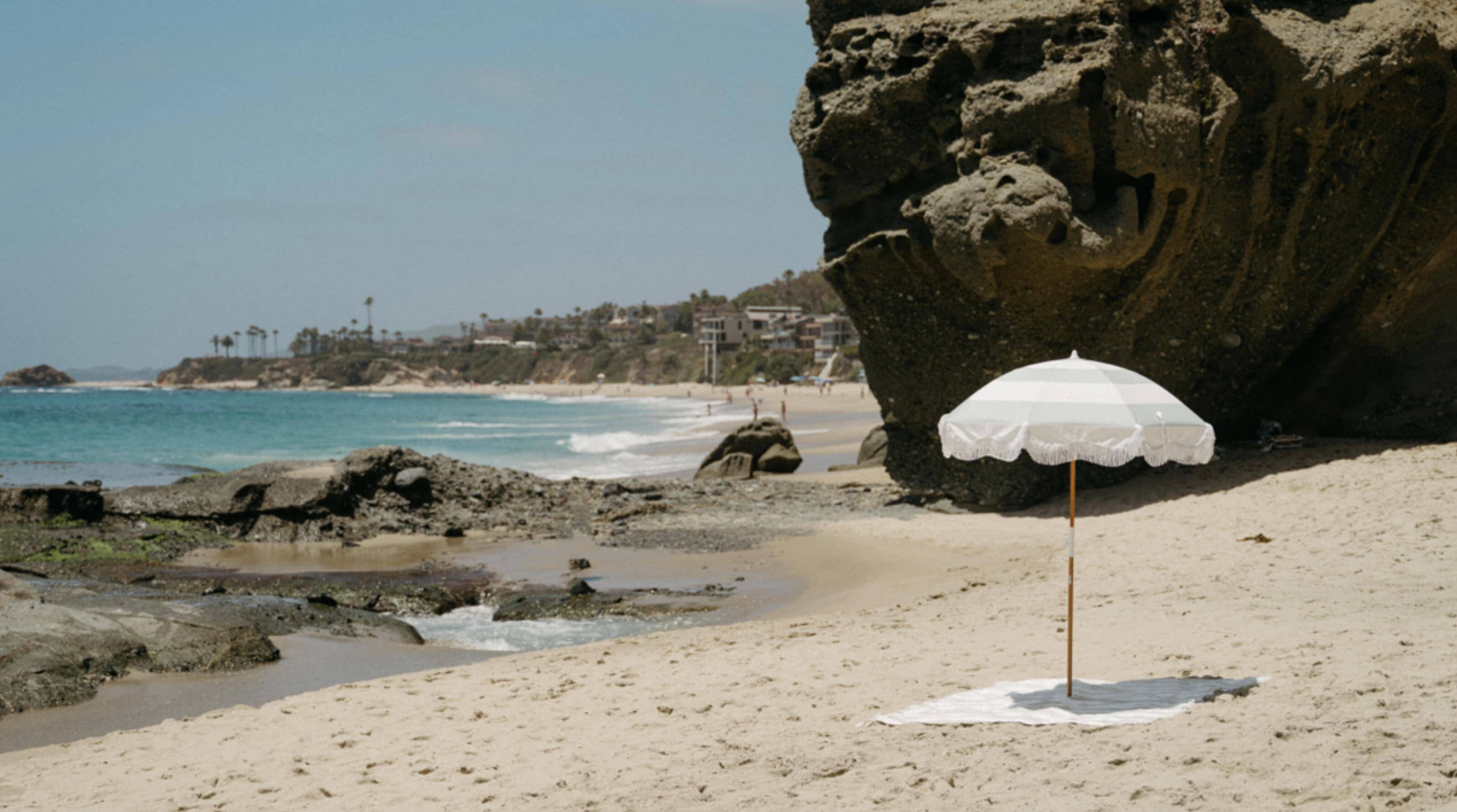 sage holiday beach umbrella on the beach