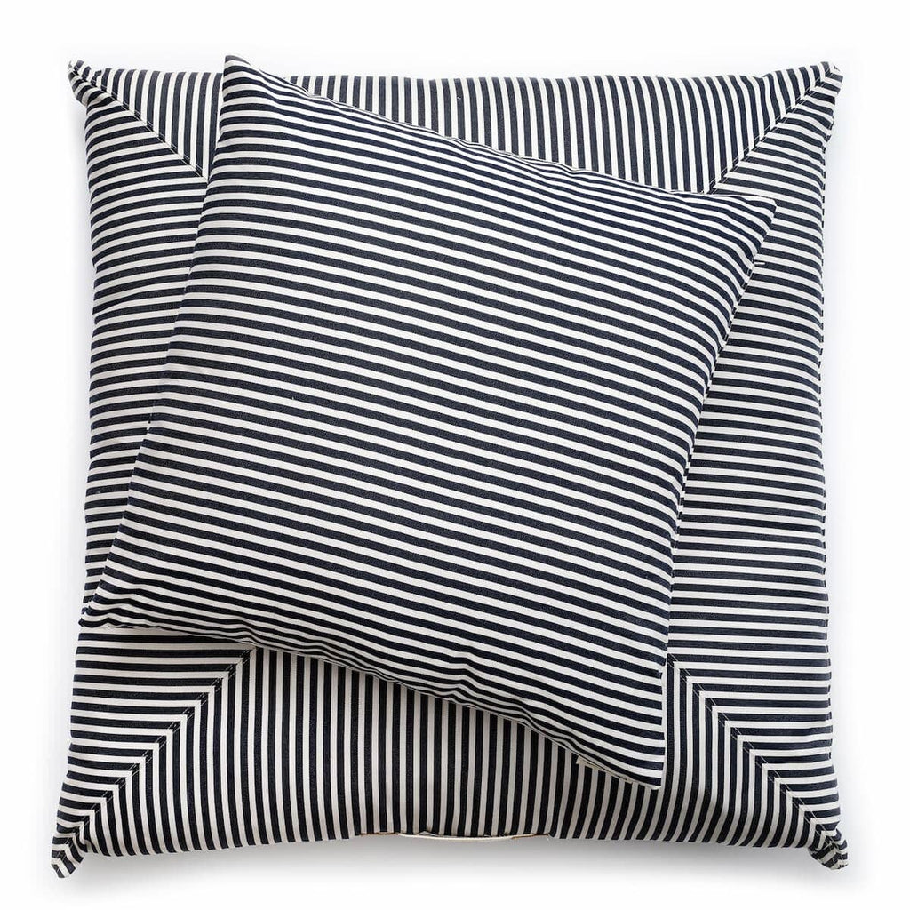 Studio image of navy stripe euro pillow and floor pillow