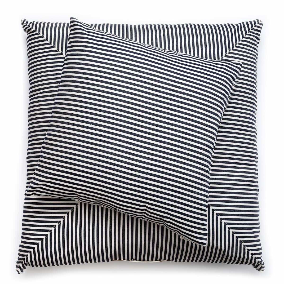 Studio image of navy stripe euro pillow and floor pillow