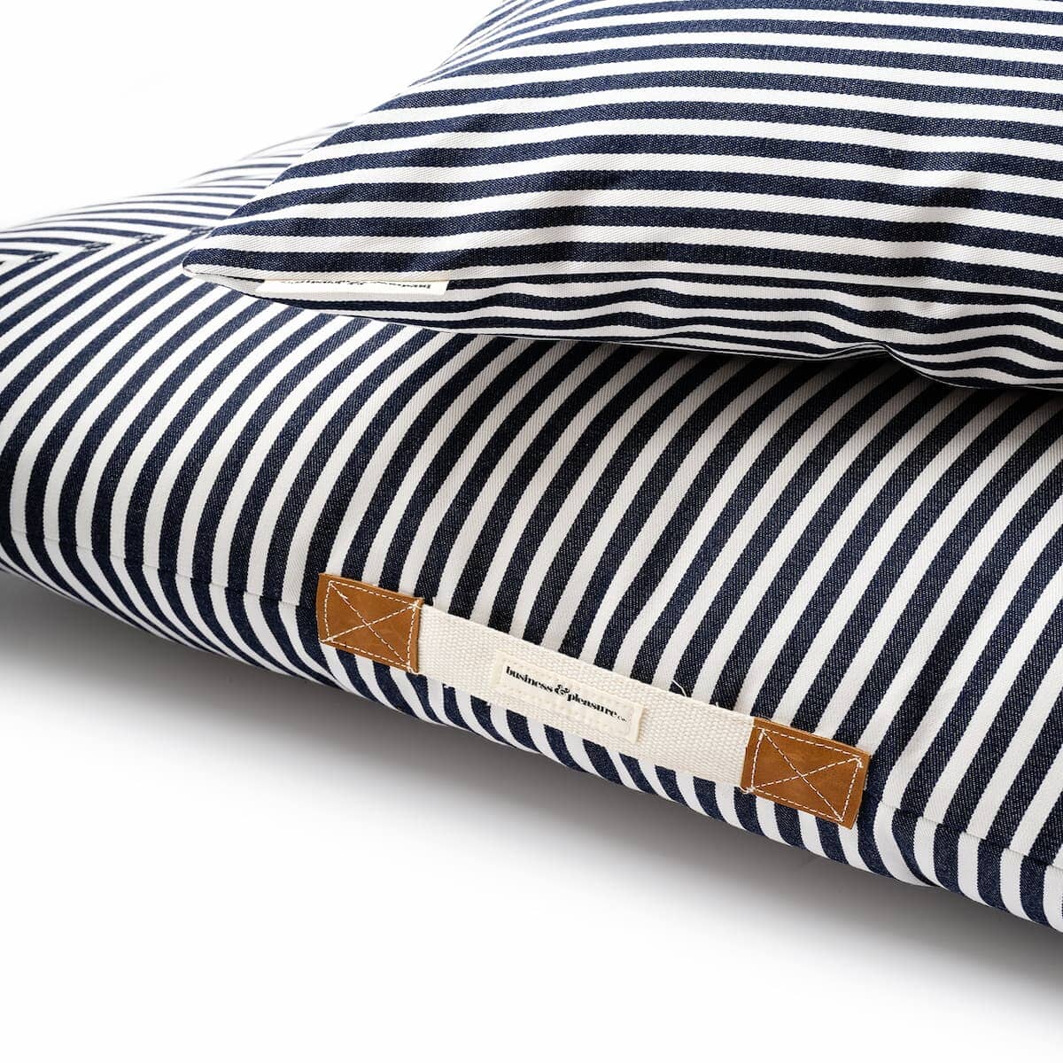 Studio image of navy stripe euro pillow and floor pillow