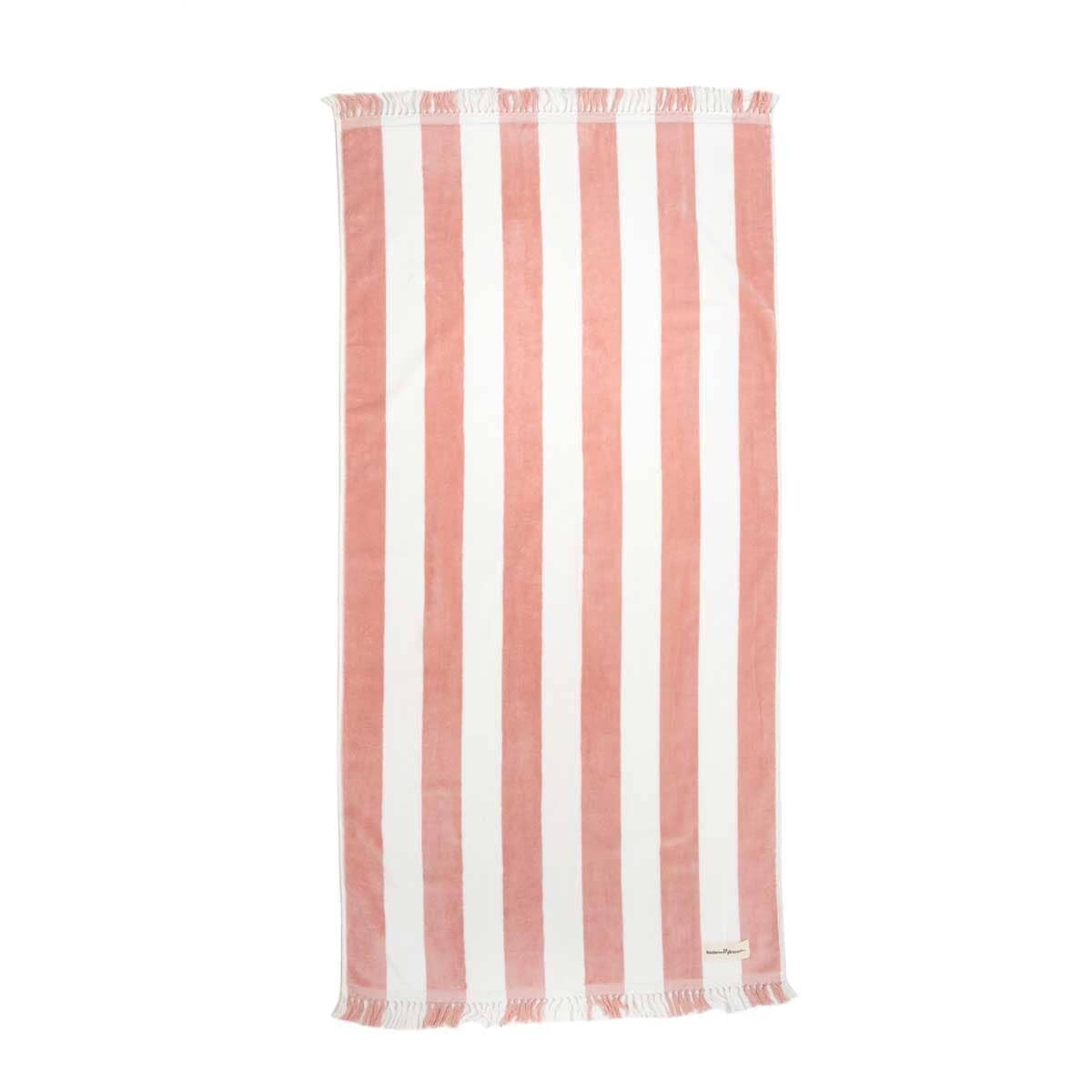studio shot of pink capri holiday beach towel
