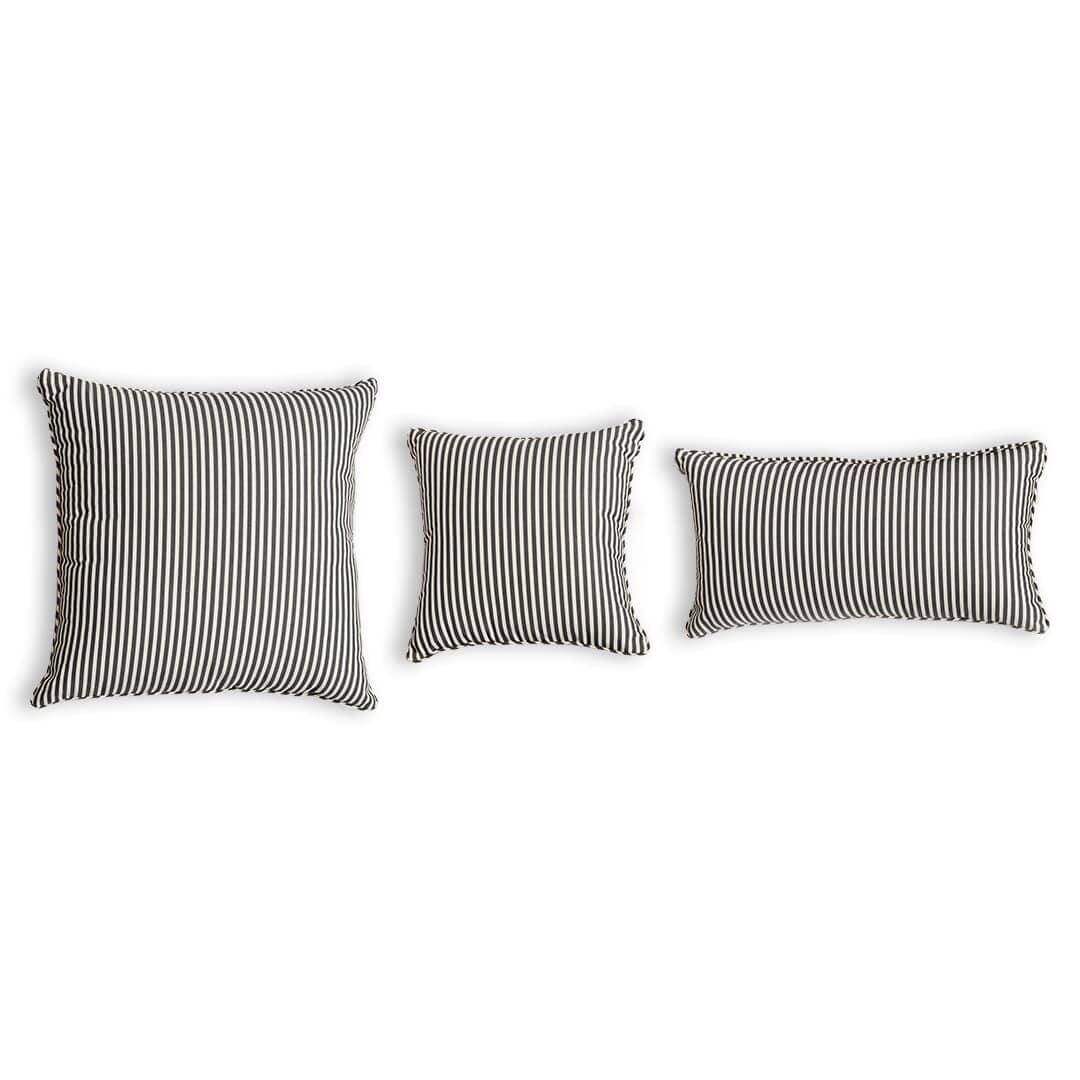 3 different size throw pillows